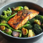 Spiced Salmon Bowl with Roasted Brussels, Sautéed Greens & Steamed Broccoli